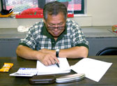 Photo of a woman using a computer in our Technology Center